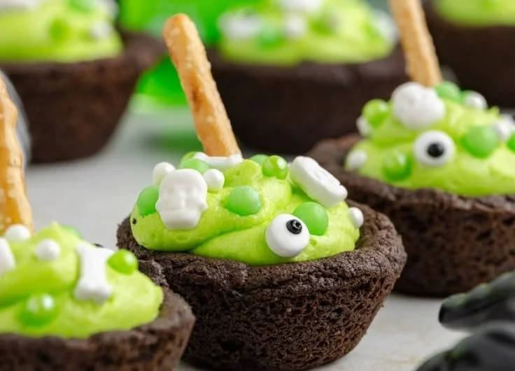 Delicious Cauldron Cookies decorated for Halloween.