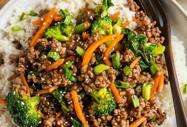 Ground beef teriyaki meal prep with colorful vegetables in meal containers