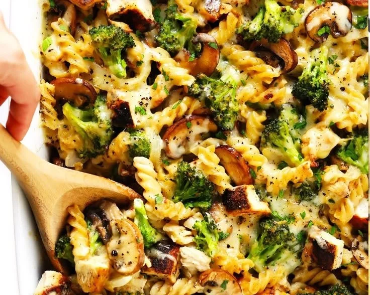 Healthy broccoli chicken casserole dish with vegetables and cheese