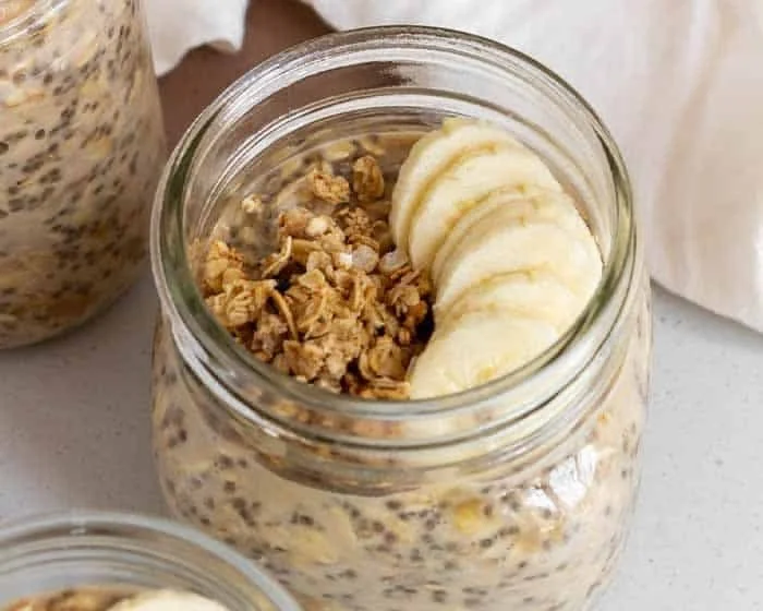 Delicious bowl of overnight oats with brown sugar topped with fresh fruit