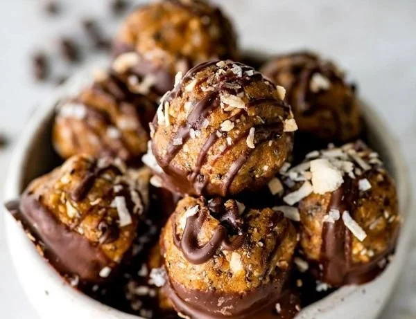Samoa-inspired protein balls made with coconut, chocolate, and nuts.