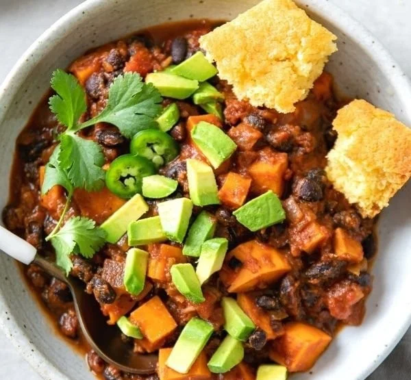 Delicious Sweet Potato Black Bean Chili served in a bowl with garnishments